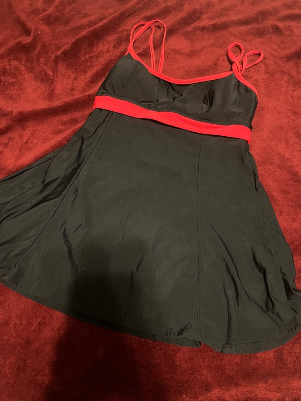 Classic Black Swimdress with Red Trim and Built-In Support